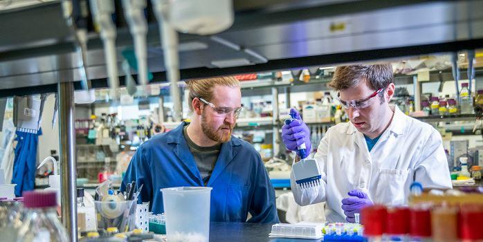 Scientists Sebastian Palluk and Daniel Arlow in their synthetic biology lab at the U.S. Department of Energy's Joint BioEnergy Institute, June 18, 2018 (Photo courtesy U.S. Department of Energy) Public domain