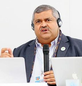 Satya Tripathi, UN assistant secretary-general, UN Environment, speaking at COP21, the 21st session of the Conference of the Parties to the UN Framework Convention on Climate Change, UNFCCC COP21; where the Paris Agreement on climate was finalized unanimously by world leaders. Paris, France December 7, 2015., Photo courtesy Earth Negotiations Bulletin) Used with permission.
