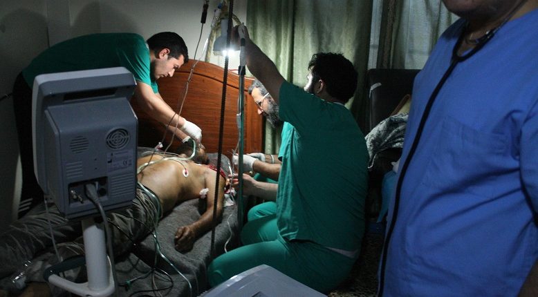 Caption: Medical team works to save a patient at a hospital in the Syrian town of Darat Izza, western Aleppo. March 13, 2020 (Photo courtesy Physicians for Human Rights) Posted for media use