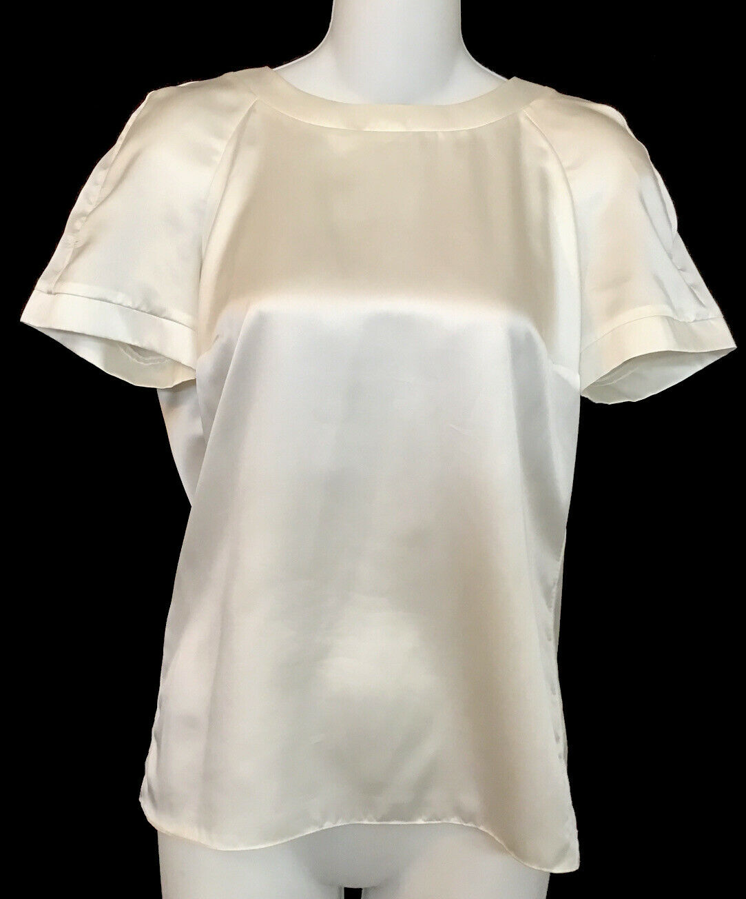 Chanel polyester blouse white short-sleeve preowned for sale on eBay, 2021 (Photo courtesy vegas_fashionista via eBay) Posted for media use 