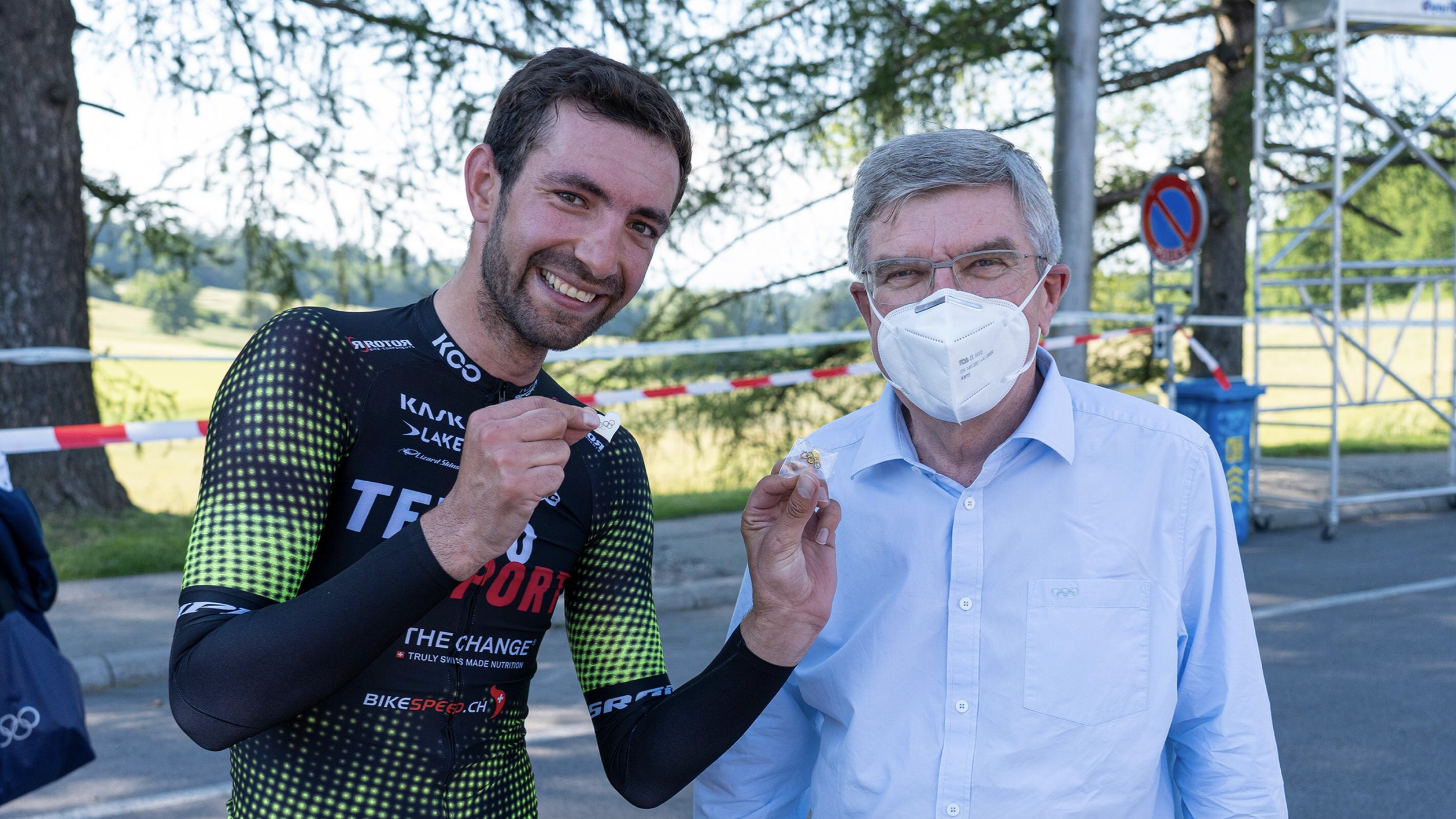  Thomas Bach, president of the International Olympic Committee (IOC), right, was at the Swiss National Cycling Time Trials to support Ahmad Badreddin Wais, one of the newly selected athletes on the IOC Refugee Olympic Team Tokyo 2020. June 16, 2021, Lausanne, Switzerland (Photo courtesy IOC) Posted for media use 