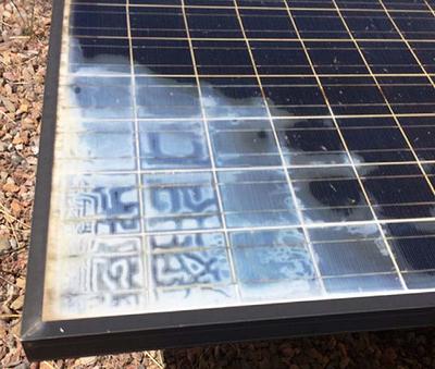 Cracked, peeling backsheet on solar panels leads to water infiltration and ribbon corrosion that impairs power output. December 2018 (Photo by Andy Walker, U.S. National Renewable Energy Lab, NREL) Public domain