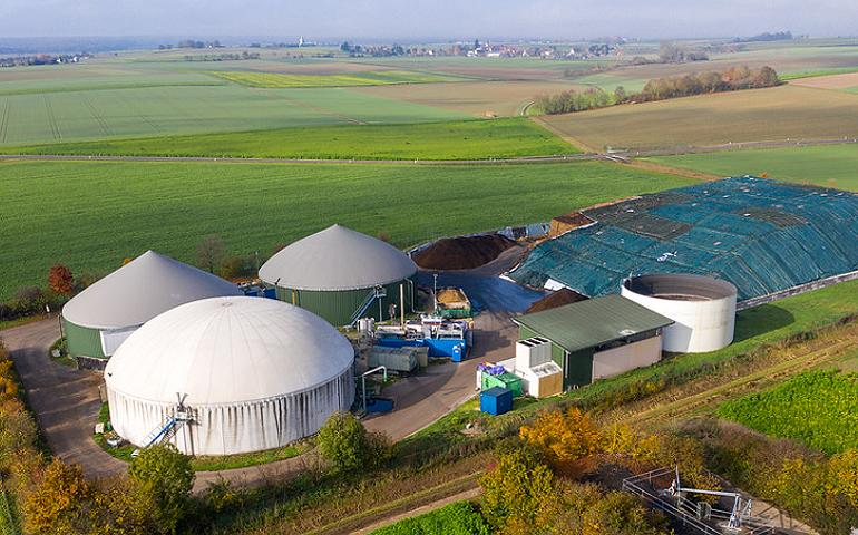 Biogas plants and cogeneration power plants at CornTec, Meppen, Germany. BG Biogas Service GmbH operates a biogas plant in the Alb-Danube region in both Langenau and Seligweiler, each with a cogeneration power plant and a satellite cogeneration power plant. The simultaneous production of electricity and heat, both of which are used, is fueled with biogas from the digestion of energy plants such as corn and whole plant silage. November 8, 2020. (Photo by MWM Energy) Creative Commons license via Flickr